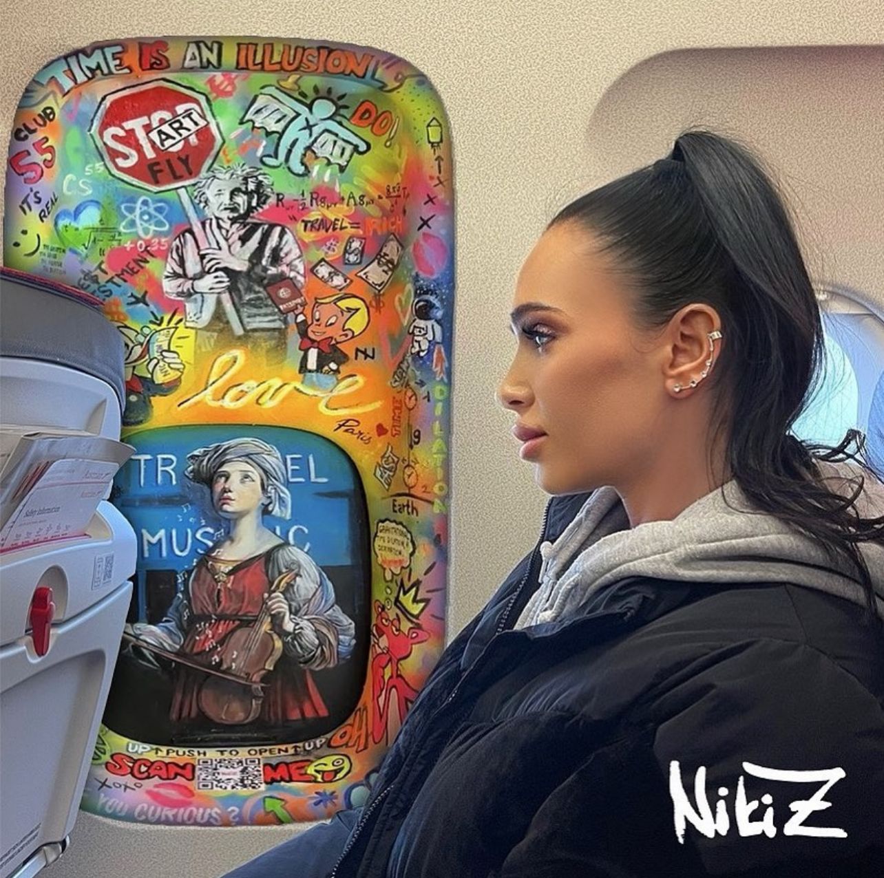 I'm painting over the original windows with panels from the airplane, this artpiece was created for Dj Snake